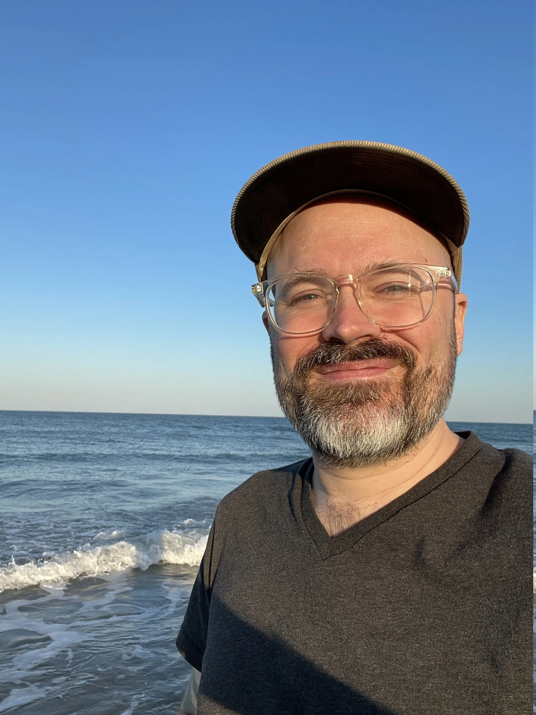 Jesse at an ocean beach in summer